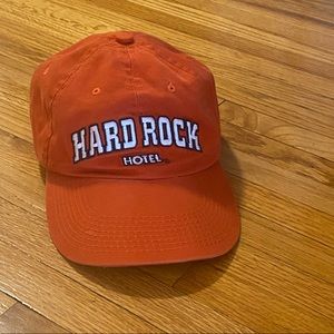 Orange Hard Rock Hotel baseball cap.